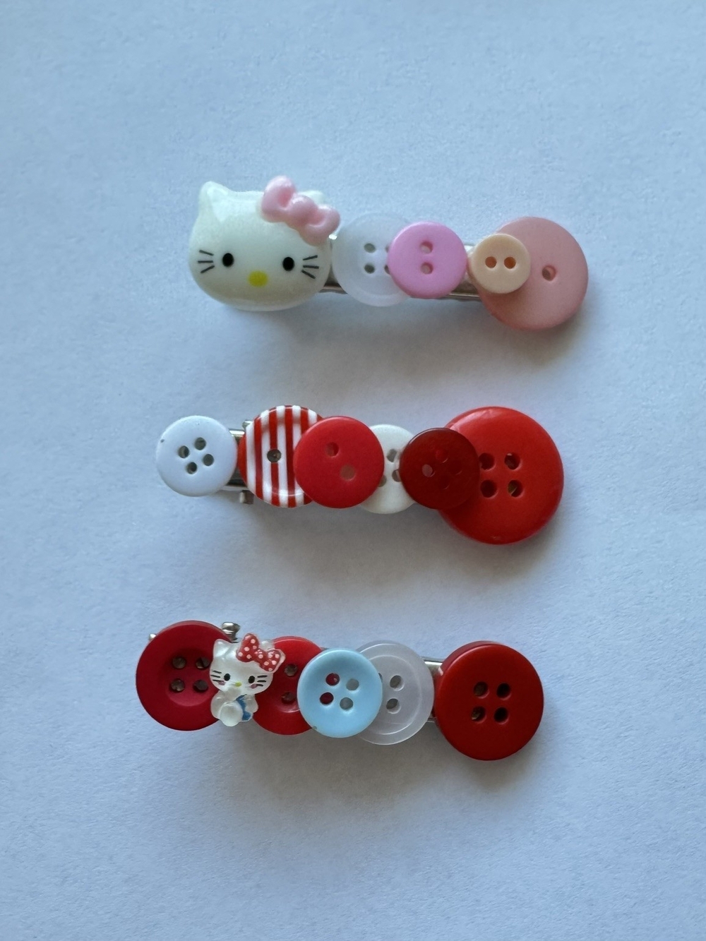 Hello Kitty Button Hair Clip Set – Pink, Red, White & Blue